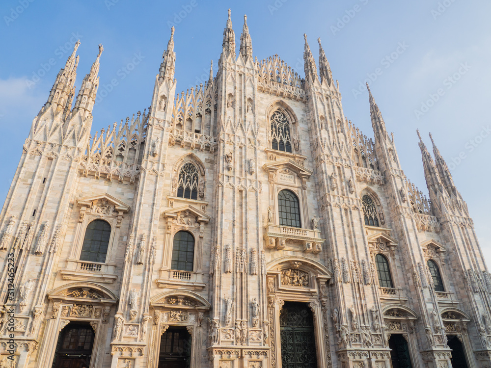 Milano, Italy. The main facade of the Dome, famous Cathedral in Milan. Duomo in Italian. The church is a main landmark of the town