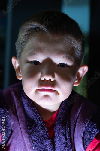 Portrait of a young boy posing for the camera