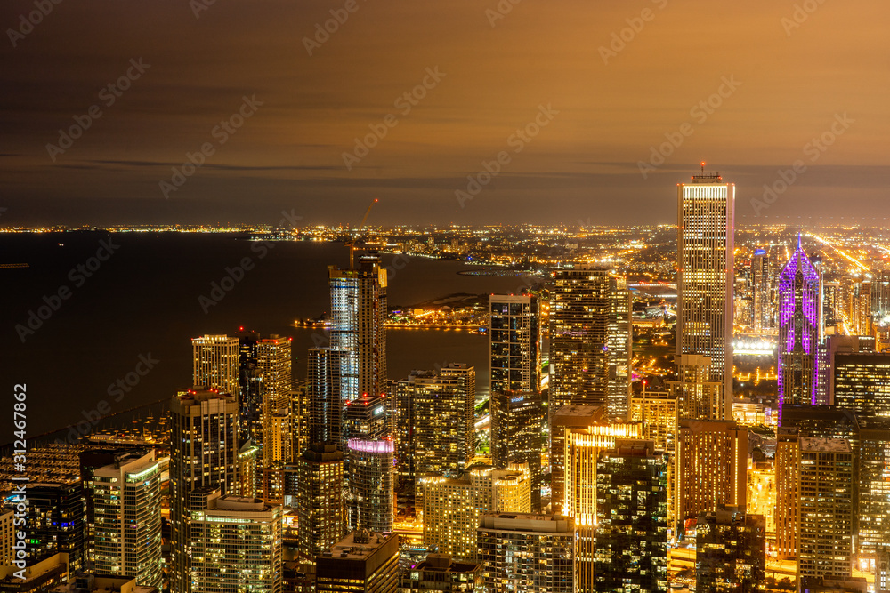 Panoramic view of Chicago downtown and the lake from Hancock tower observation desk in Chicago , Illinois , United States of America