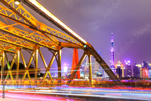 Architectural landscape and colorful lights at night in Shanghai