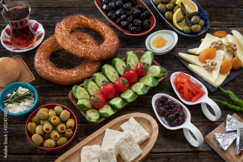 Traditional Turkish breakfast with Turkish bagel simit on the table