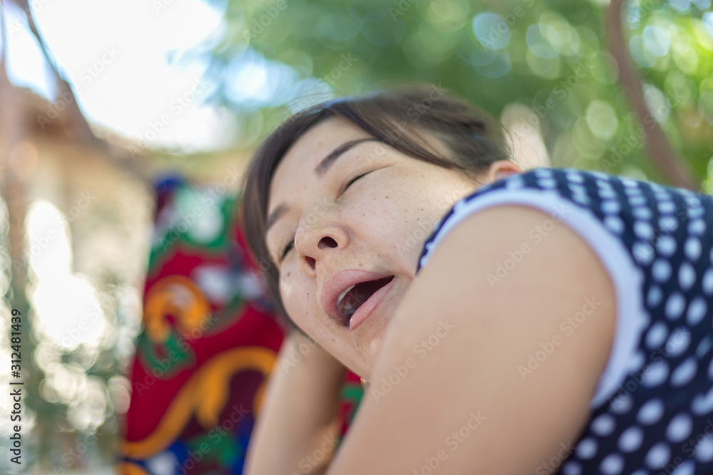 Good morning. Beautiful and happy girl woke up in the morning. She's sleeping Good morning. Beautiful and happy girl woke up in the morning. She's sleeping