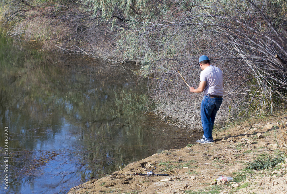man on fishing, beautiful surrounding nature man on fishing, beautiful surrounding nature