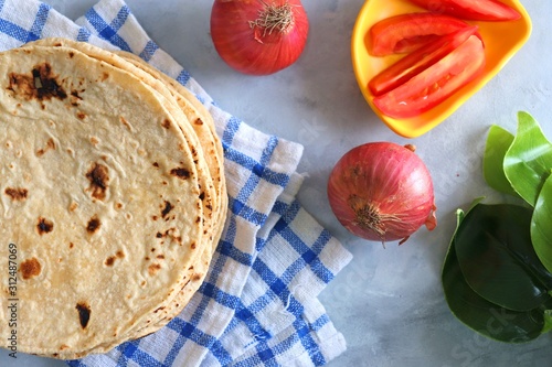 Indian Chapati / Fulka or Gehu Roti. It's a Healthy fiber rich traditional Indian food. photo