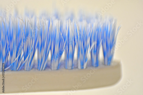 close up blue and white tooth brush, tooth brush with white background