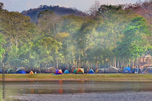 Landscape of lots of tent beside the reservoir, river at Samlan national park, Saraburi, Thailand photo