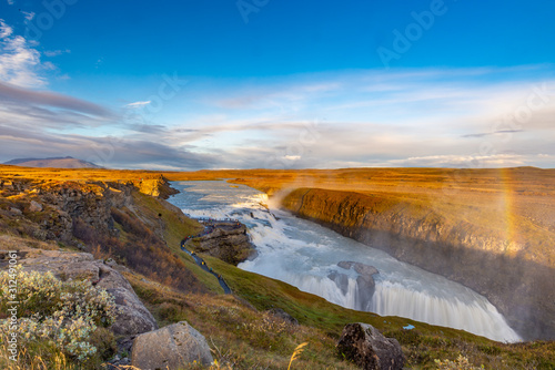 Gullfoss waterfall seen from afar with unrecognisable visitors  Iceland