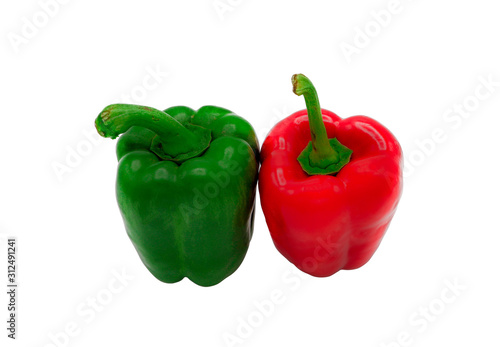 Close up top view of red and green peppers isolated to white background with selective focus