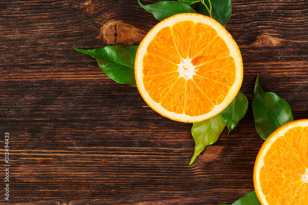 Sliced into pieces juicy ripe oranges close up Sliced into pieces juicy ripe oranges close up