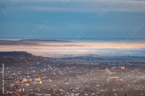 Morning city in the fog © onyx124