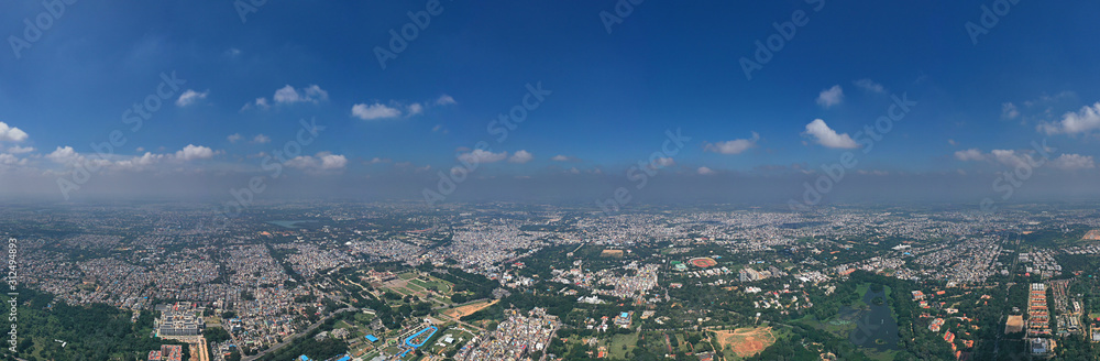 Panoramic Cityscape aerial view of urban areas against clear blue sky, india. Panoramic Cityscape aerial view of urban areas against clear blue sky, india.