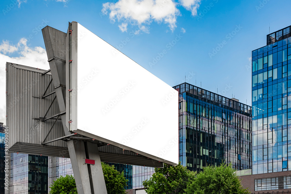 Advertising billboard mockup in front of modern office buildings Stock ...