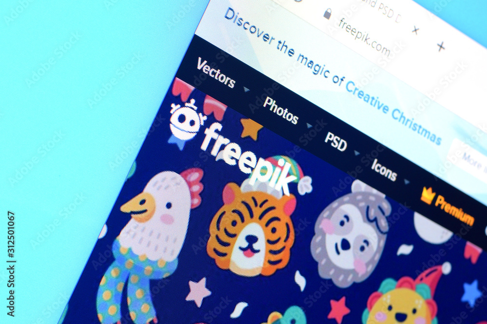 Homepage of freepik website on the display of PC, url - freepik.com ...