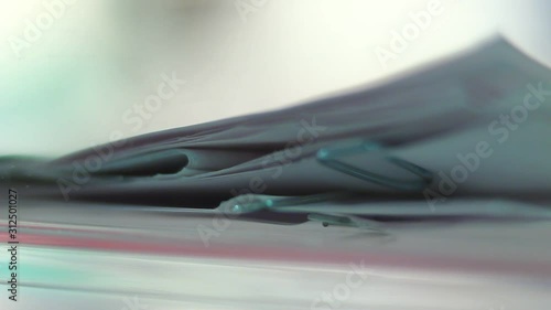 Macro of documents, papers, stack of papers, staples.