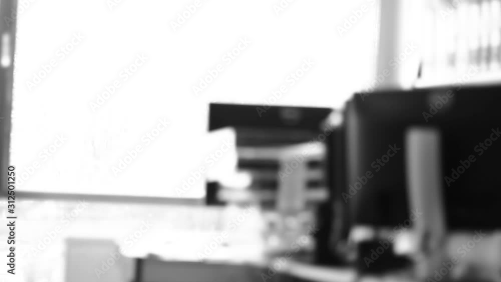 Workers working in the office, using computers. Close up. Workers working in the office, using computers. Close up.
