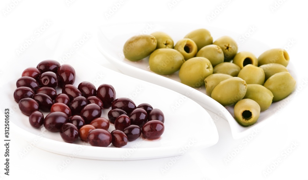 Studio shot of olives on plate Studio shot of olives on plate