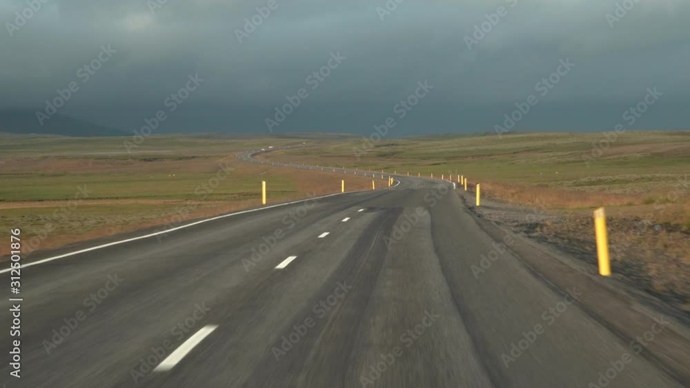 Car driving on the road to Iceland. Inside view of a car. Road number 1 is Iceland's main road. Dramatic sky. 4K Car driving on the road to Iceland. Inside view of a car. Road number 1 is Iceland's main road. Dramatic sky. 4K