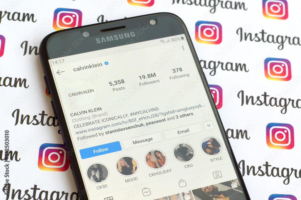 Calvin Klein official instagram account on smartphone screen on paper  instagram banner. Stock-Foto | Adobe Stock
