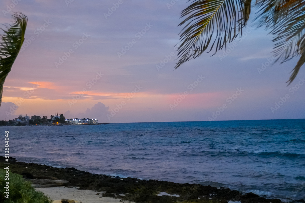 Background of the nature of the beach sunset that surprises with endless horizon and incredible foamy waves Background of the nature of the beach sunset that surprises with endless horizon and incredible foamy waves