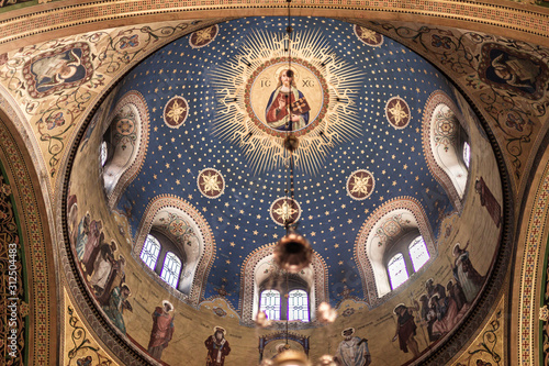Serbian orthodox Saint spyridon church (Chiesa di San Spiridione) in Trieste, Italy near the canal grande on the square saint antonio nuovo with the white domes and details of the cathedral.