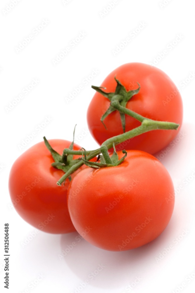 Close-up of tomatoes on white background