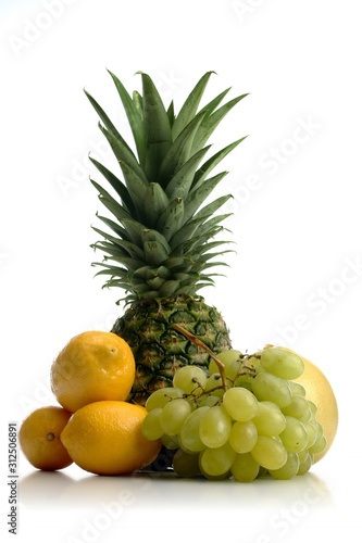 Composition of exotic fruits on white background