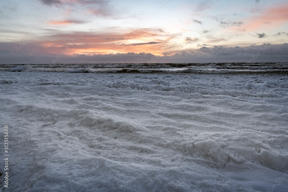 Obraz premium Icy baltic sea coast in winter next to Liepaja, Latvia.
