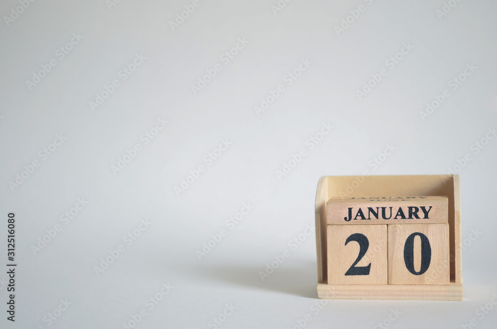 January 20, Empty white background with number cube on the table. January 20, Empty white background with number cube on the table.