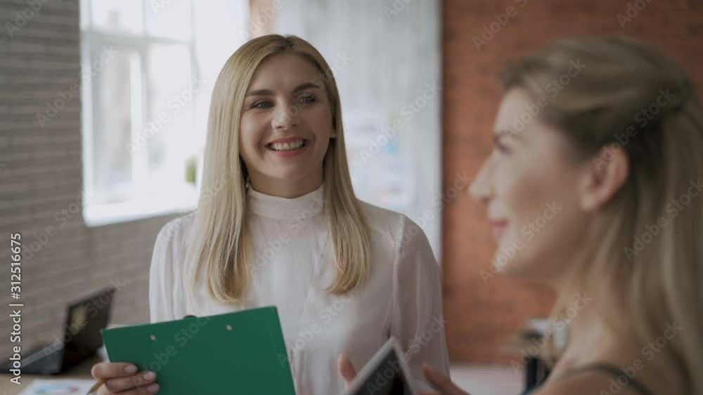 customer survey. a woman asks questions to a client regarding the quality of service. 4K customer survey. a woman asks questions to a client regarding the quality of service. 4K