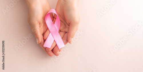 Billede på lærred Pink ribbon concept. National cancer survivor day.