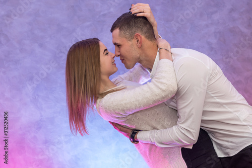 St. Valentine's day. Boyfriend making surprise to his girl in love