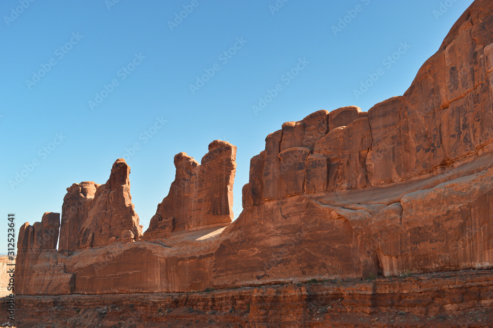 Big stone monuments in desert in the Monument valley near Arizona Utah borders Big stone monuments in desert in the Monument valley near Arizona Utah borders
