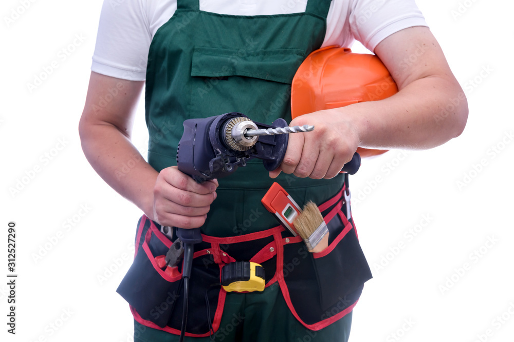 Man in coverall holding drill machine isolated on white Man in coverall holding drill machine isolated on white