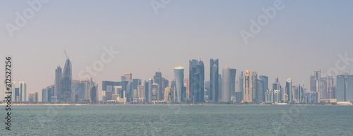 Doha, Qatar - probably the most notable landmark in Doha, the Corniche is a waterfront promenade extending for seven kilometers along Doha Bay. Here in particular its skyline
