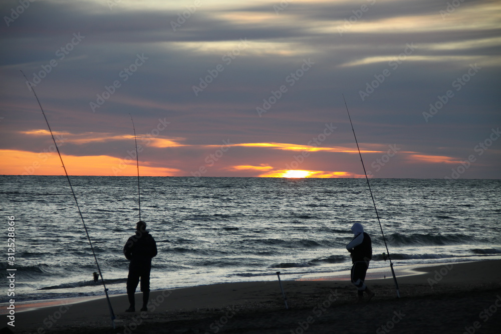 fishing at nice sunset evening