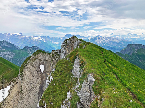 Alpine peak Diethelm above the Wagital or Waegital valley and alpine Lake Wagitalersee (Waegitalersee), Innerthal - Canton of Schwyz, Switzerland photo