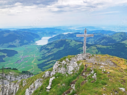 Alpine peak Diethelm above the Wagital or Waegital valley and alpine Lake Wagitalersee (Waegitalersee), Innerthal - Canton of Schwyz, Switzerland photo