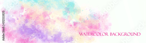 Rainbow watercolor background. Colorful texture banner with free copy space for your graphic design or text. Vector illustrator. Ethereal colors. Subtle and delicate surface. 