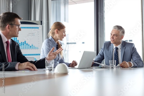 Wallpaper Mural Business people having discussion at table in board room Torontodigital.ca