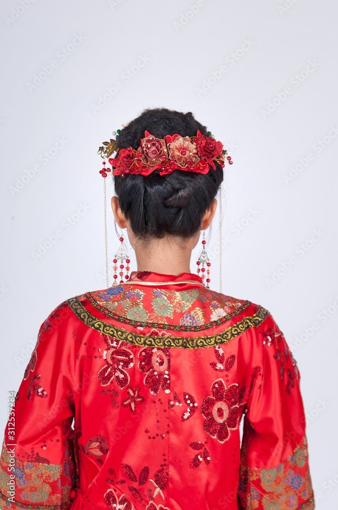 Fototapeta premium Young attractive chinese woman wearing traditional costume