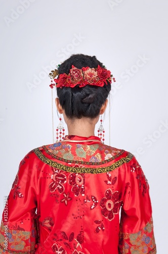 Young attractive chinese woman wearing traditional costume