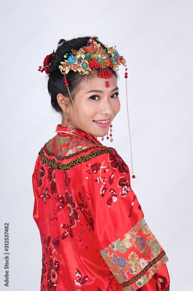 Young chinese woman wearing traditional costume Young chinese woman wearing traditional costume