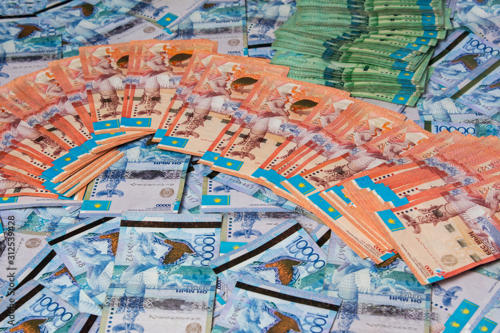 Obraz premium Paper banknotes tenge KZT. Tenge is the national currency of Kazakhstan. bank of Kazakhstan