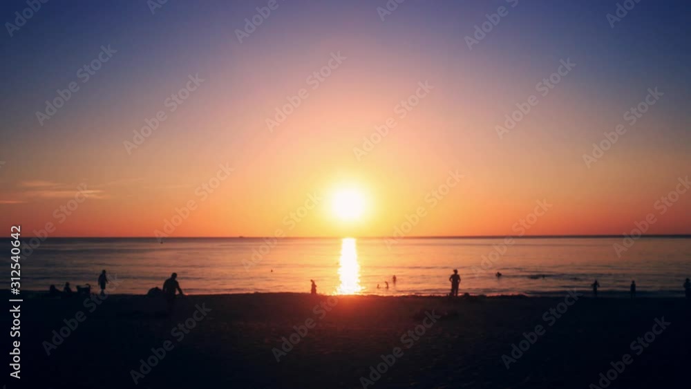 4K UHD Time lapse of sunset across the beach and sea. 4K UHD Time lapse of sunset across the beach and sea.