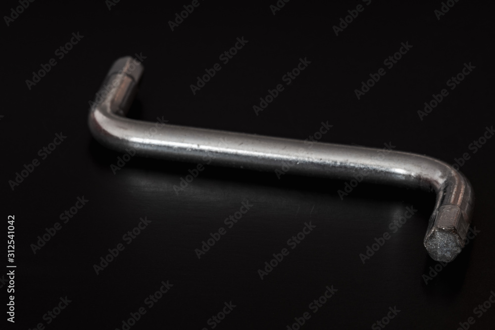 hexagon socket screw allen key in a black background isolated hexagon socket screw allen key in a black background isolated