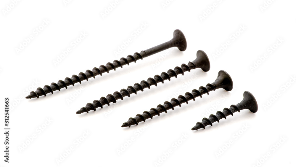 Black metal screws of different sizes on a white isolated background_ Black metal screws of different sizes on a white isolated background_