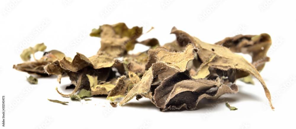 Fototapeta premium Dried oregano leaves seasoning isolated on white background
