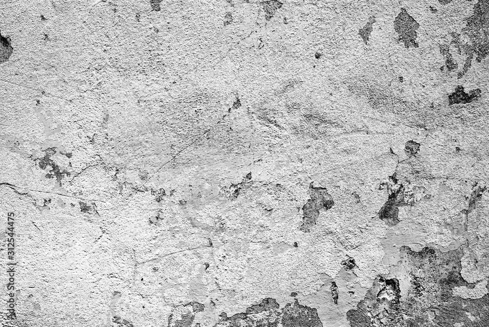 Texture of a concrete wall with cracks and scratches which can be used as a background Texture of a concrete wall with cracks and scratches which can be used as a background