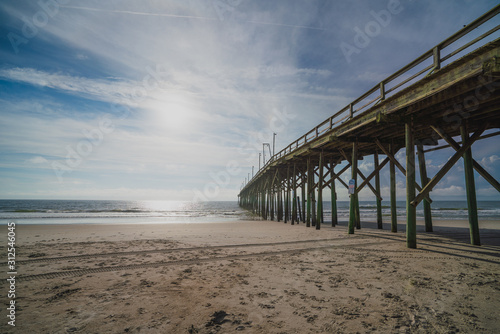 Wooden pier on beach © Nathan