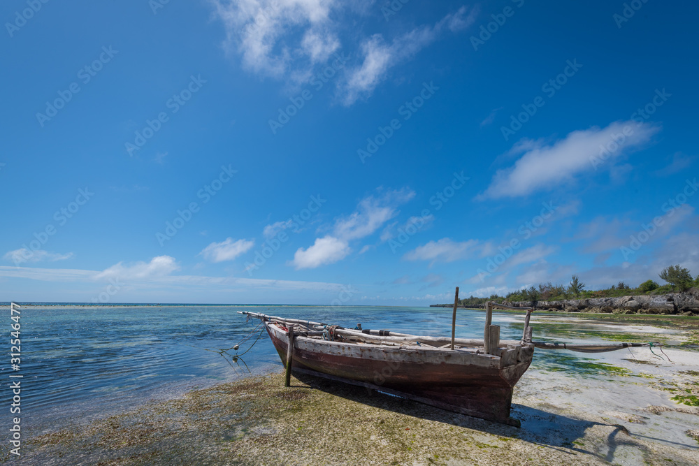 Fishing boat on the east coast of Zanzibar Fishing boat on the east coast of Zanzibar